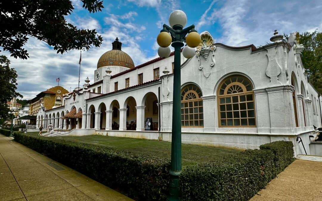 Quapaw Bathhouse, a Spanish-Colonial structure in Downtown Hot Springs, Arkansas with lamp posts