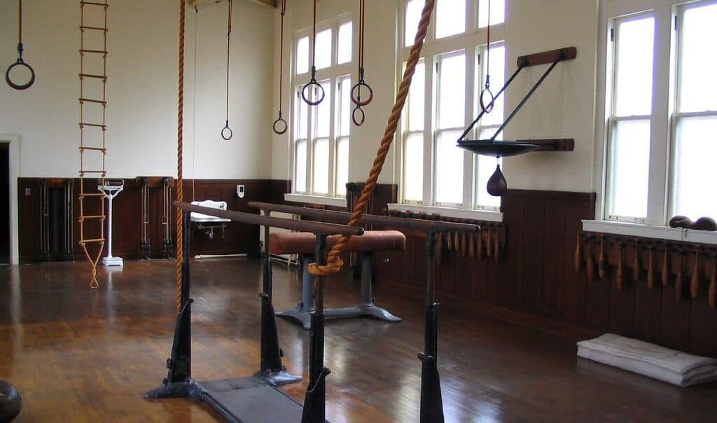 1920s-era gym as Fordyce Bathhouse in Hot Springs  Arkansas with poles and rings, one of the best Arkansas museums

