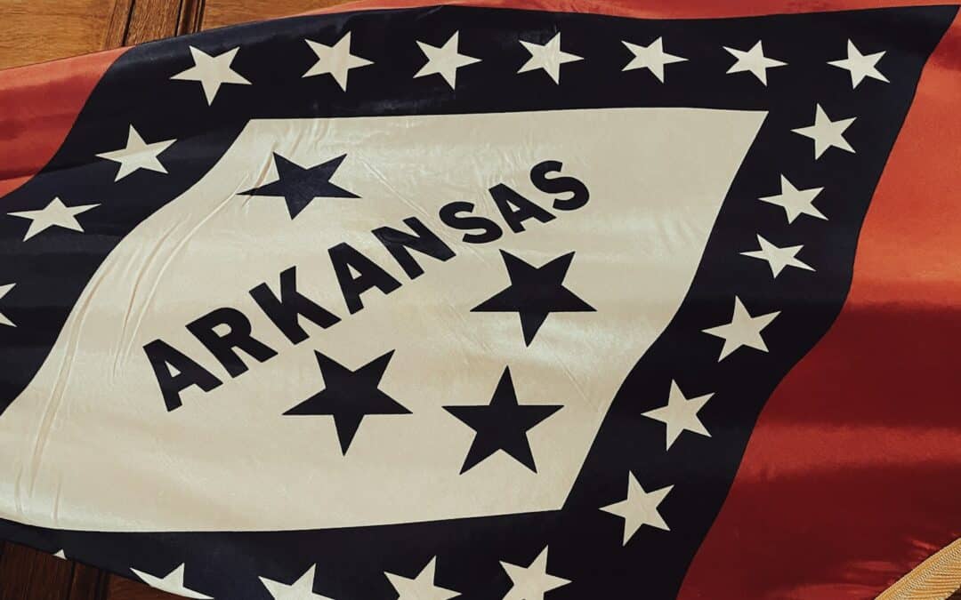 A flag with the name of the state of rAkansas