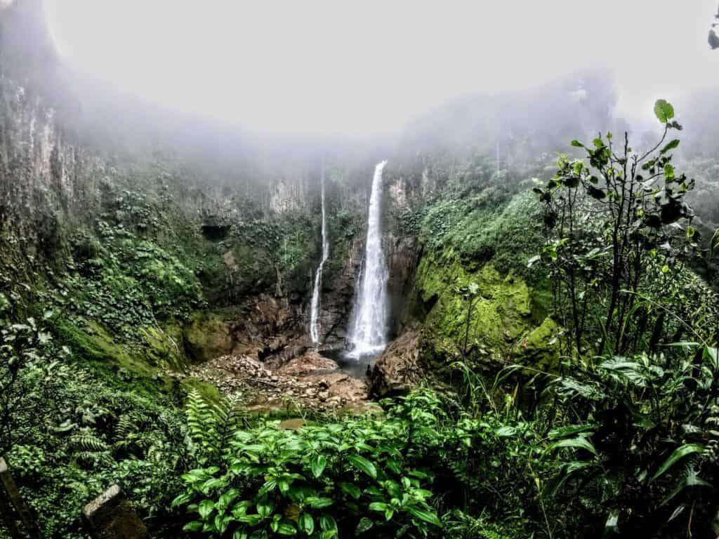 Catarata del Toro waterfall in Costa Rica surrounded by lush jungle
